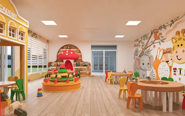 Khu vui chơi trong nhà của trường mầm non Thảo Nguyên: quầy sách hình cây nấm, tranh tường vẽ voi và hươu cao cổ, bàn ghế gỗ thấp cho bé